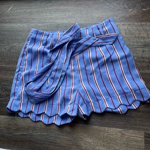Blue with white and red pen striped shorts